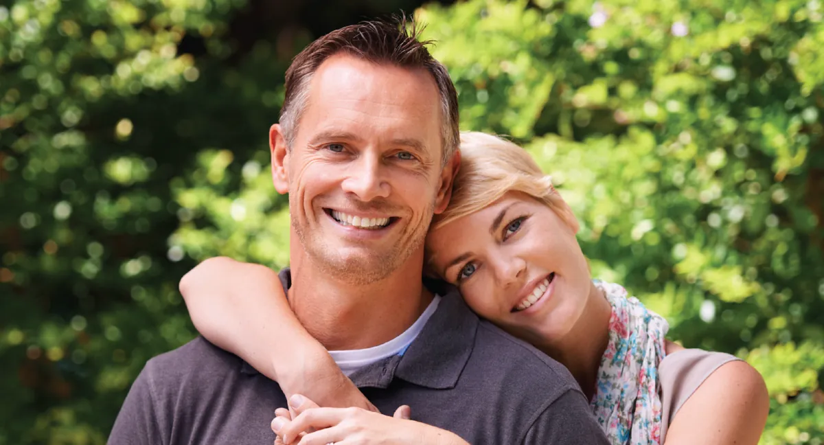 Smiling couple outdoors