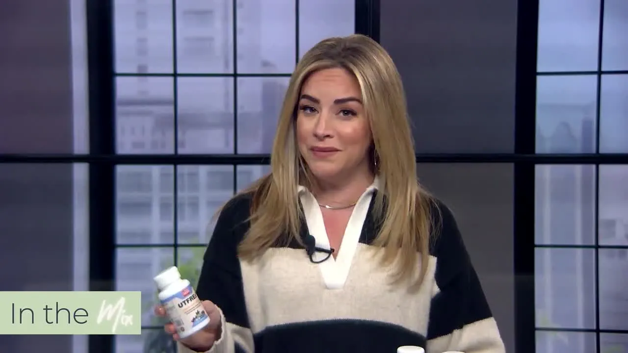 TV host presenting A Pure Herb supplements on In the Mix